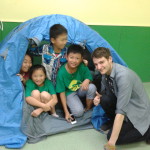 My happy students in a tent they pitched
