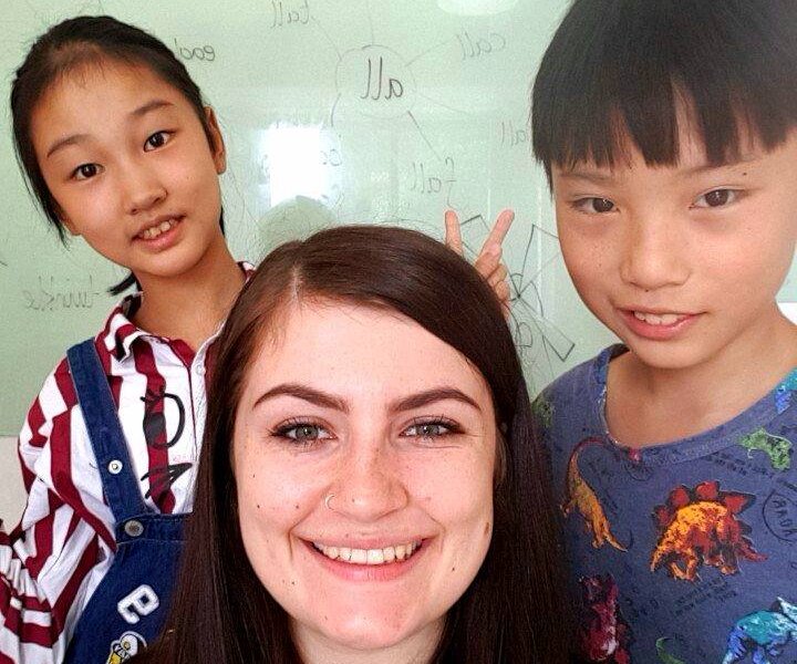 Me with 2 of my students at i2 education Guizhou China