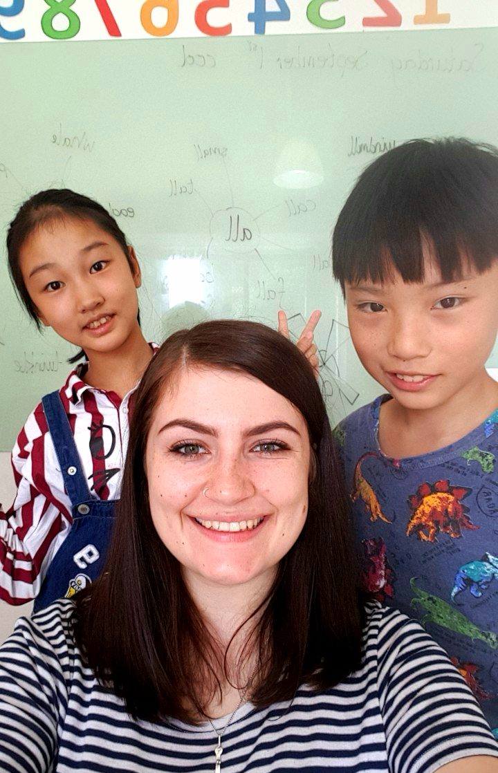 Me with 2 of my students at i2 education Guizhou China